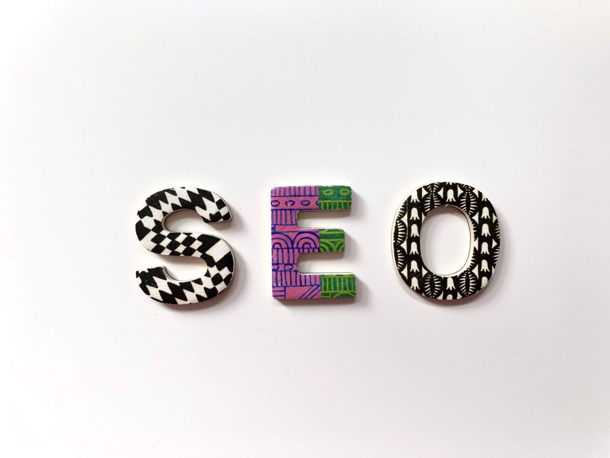 Different patterned letters spelling out SEO against a white background