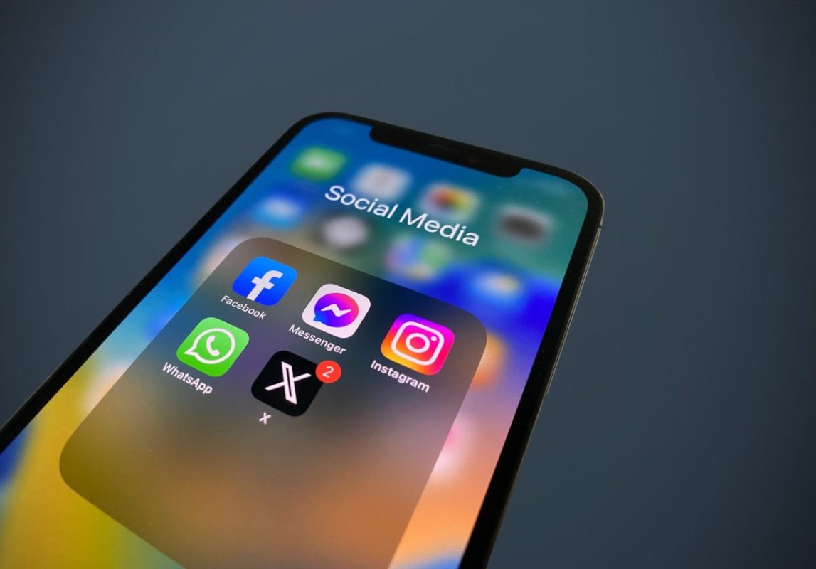 An iphone that is showing several social media apps
