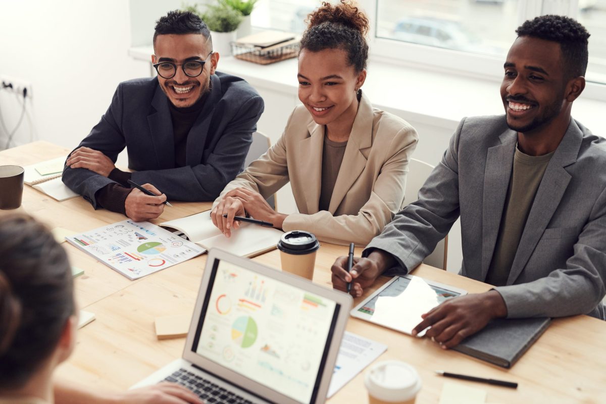 A group of business professionals sitting in a meeting