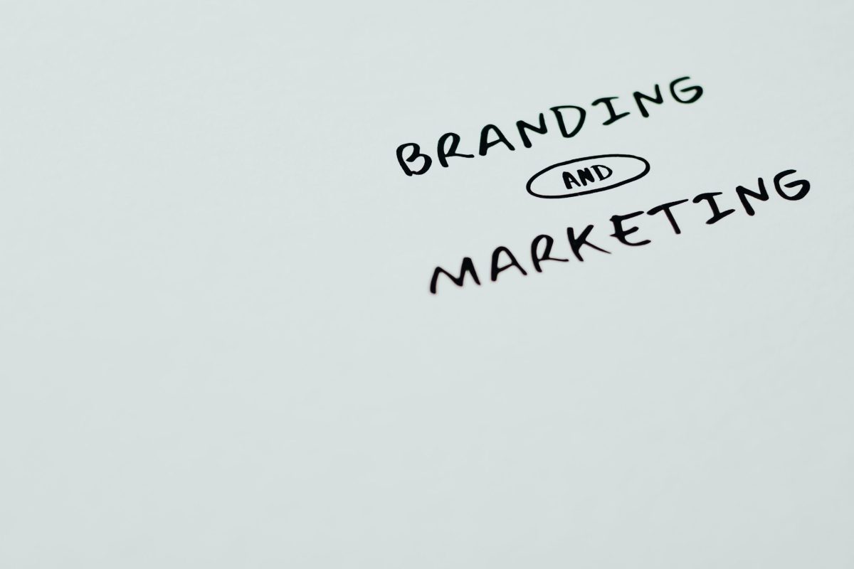The words “Branding and Marketing” written on a white piece of paper