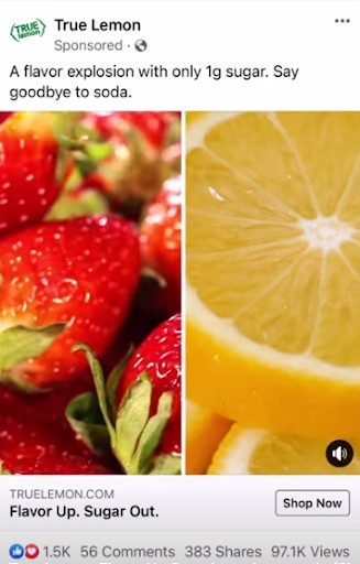 An ad for a drink mix showing strawberries and a lemon